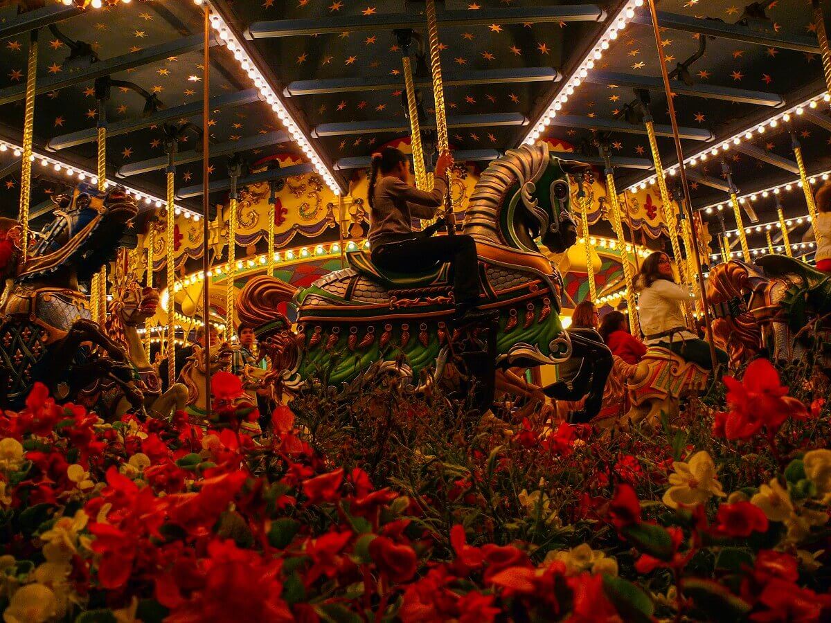 The Carrousel de Lancelot View past a flowerbed to the Carrousel de Lancelot in Fantasyland