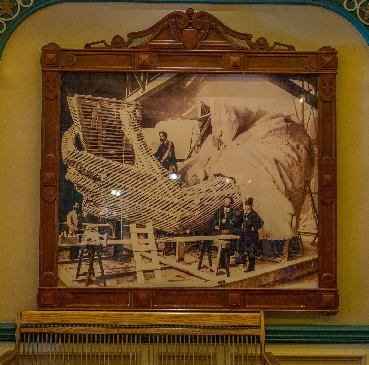 Skeleton structure of the hand of the Statue of Liberty Oversized historical photo of the skeletal structure of the hand of the Statue of Liberty under construction.