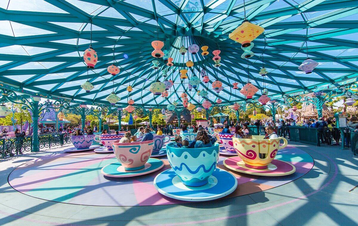 The teacups in Fantasyland At the Mad Hatter Tea Cups attraction, several colorful tea cups with passengers in them spin around merrily