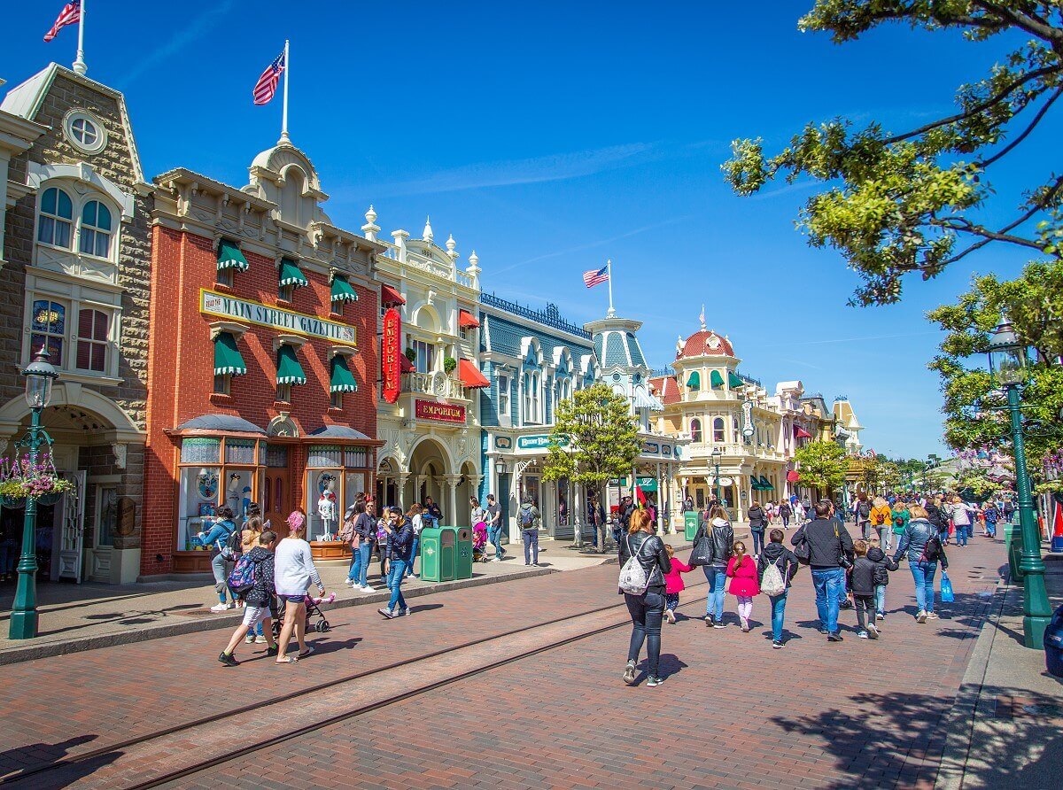 Main Street U.S.A. Building. Main Street U.S.A. buildings, Main Street Gazette, Emporium, Bixby Brothers, Walt's - An American Restaurant, as seen from across the street.