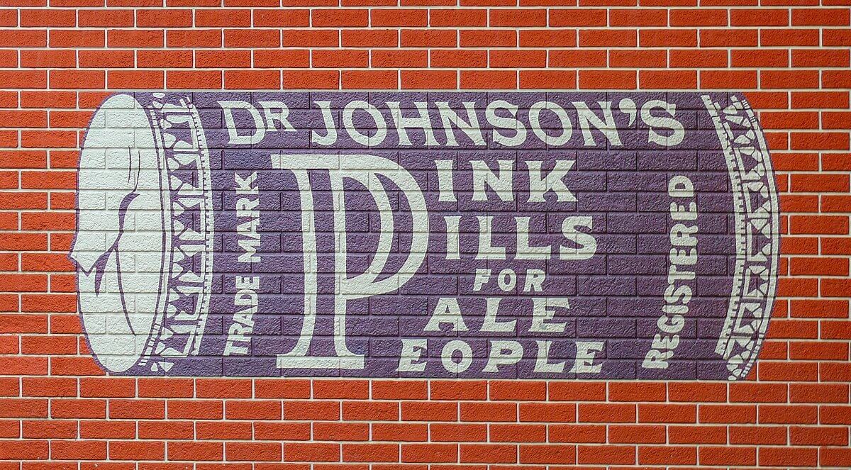 Advertisement for Dr. Johnson's Pills for Pale People on a house wall Advertisement for Dr. Johnson's Pills for Pale People on a house wall