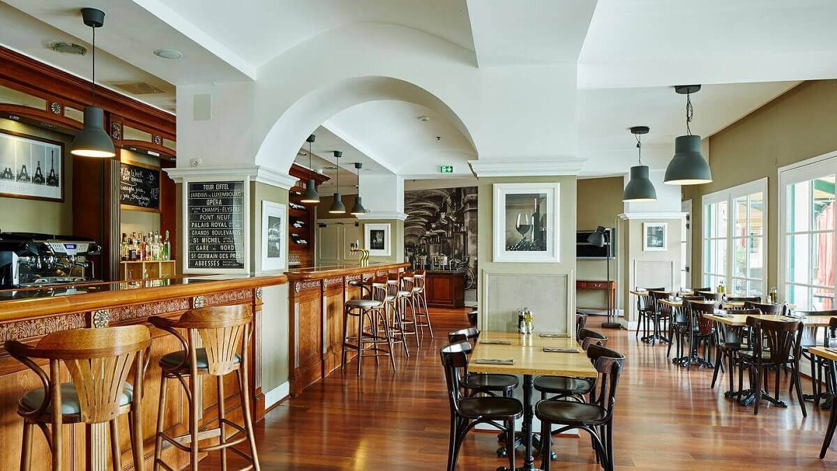 Hotel bar View of the hotel bar with a bistro-style dining room