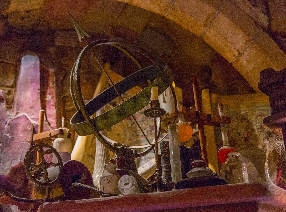 Scientific work product On a shelf in Merlin's shop are various scientific working objects