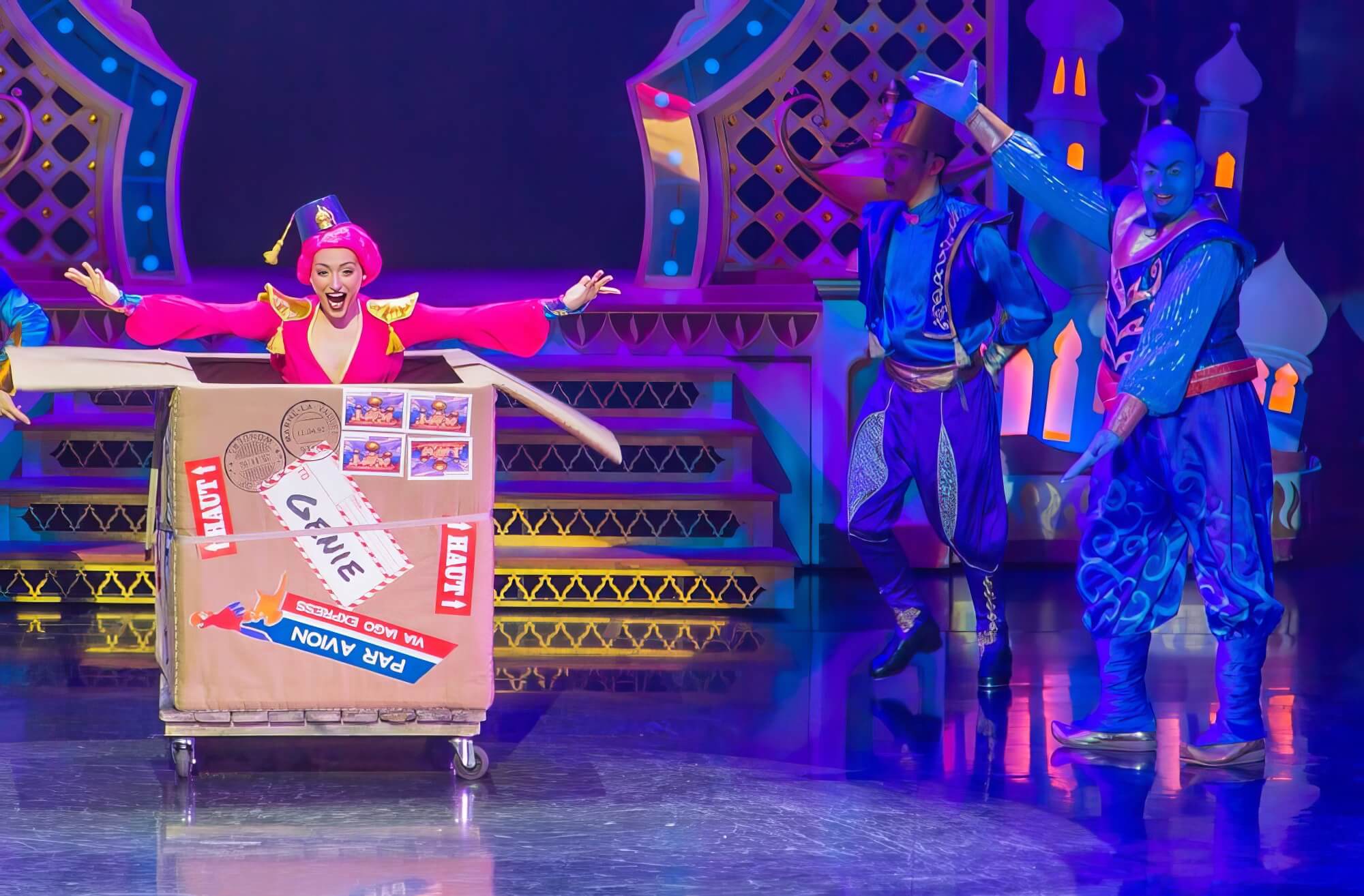 Dancer jumps out of the package From Djinni's enchanted package jumps a dancer in red costume with Arabian hat