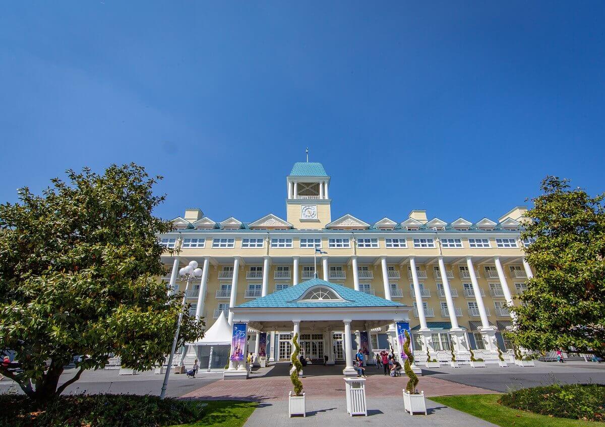 Newport Bay Club Front View The main entrance of the Newport Bay Club surrounded by trees