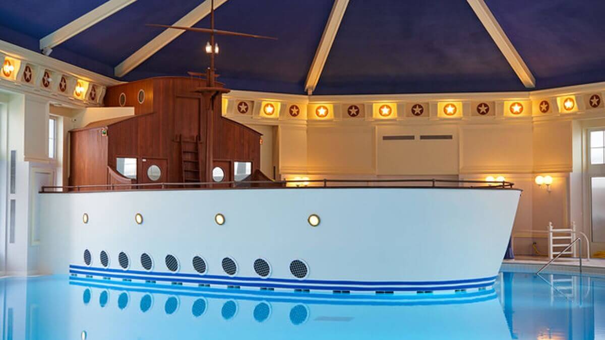 Indoor Pool Hotel Newport Bay Club The bow of a stylized ship juts into the indoor pool.