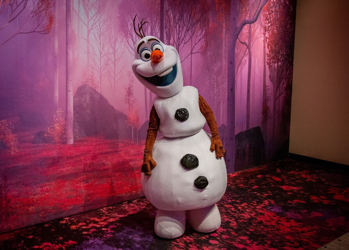 Olaf Meet & Greet Olaf from Frozen at his meeting place - he looks cheerful and has his head slightly tilted
