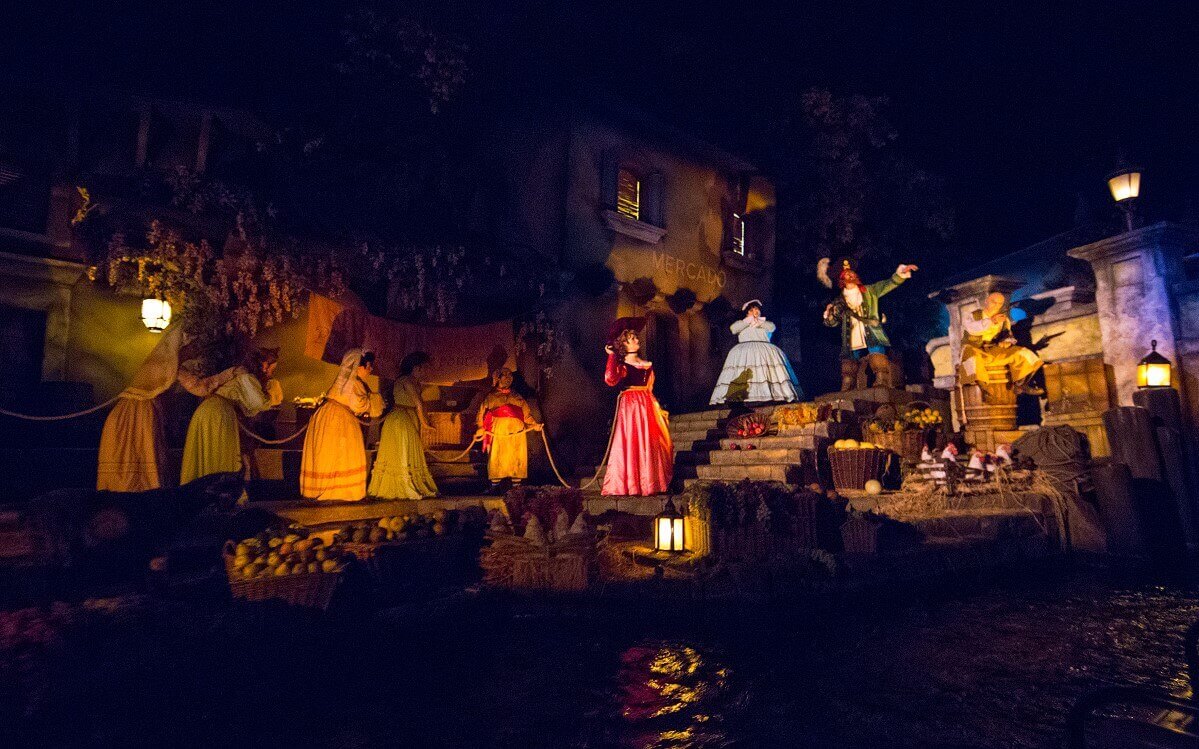 Auction scene at Pirates of the Caribbean in a scene of Pirates of the Caribbean a pretty redhead and other people are to be sold at an auction