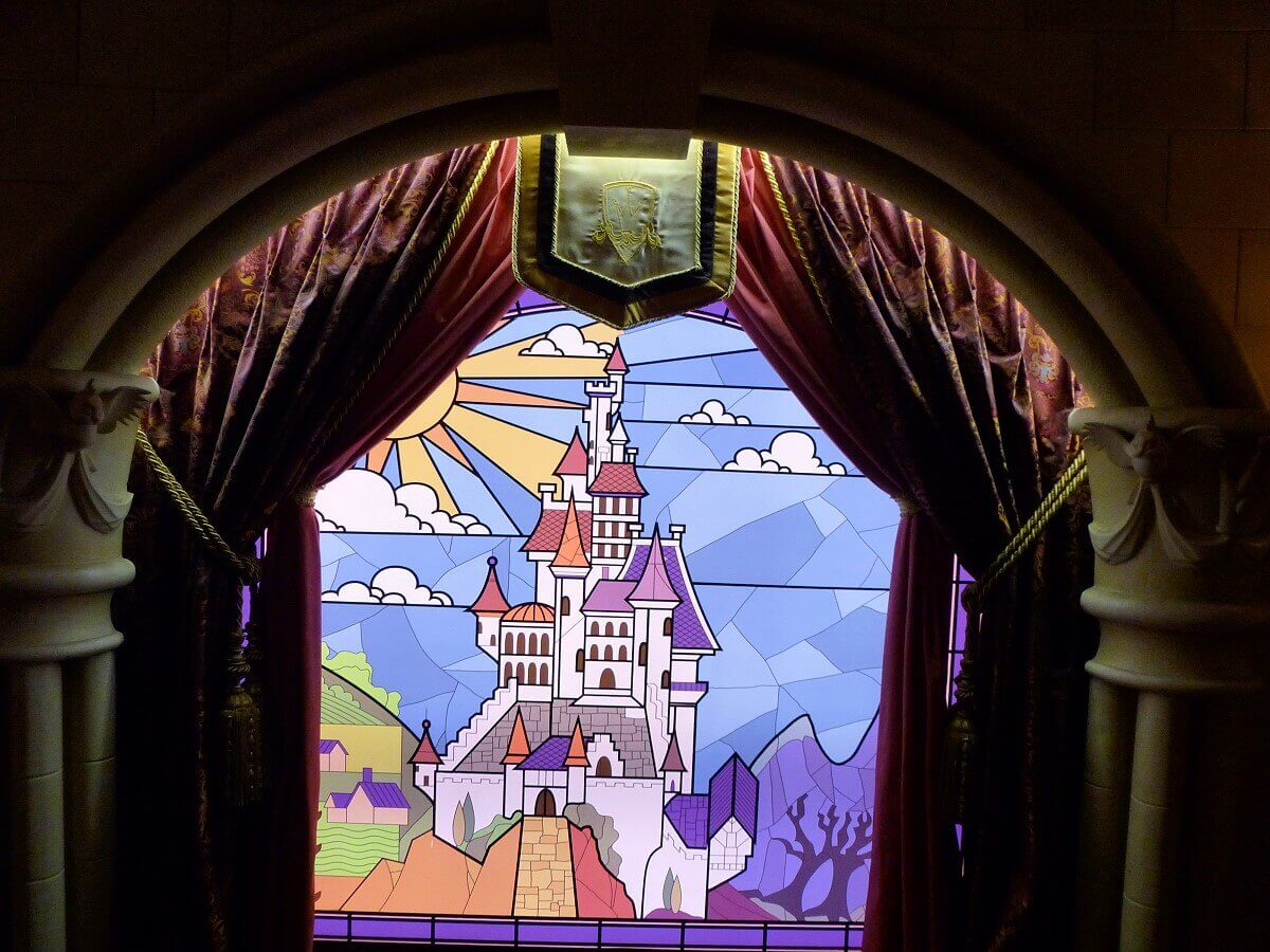 The castle of the beast Stained glass window with an image of Beast's castle from Beauty and the Beast in the Princess Pavilion