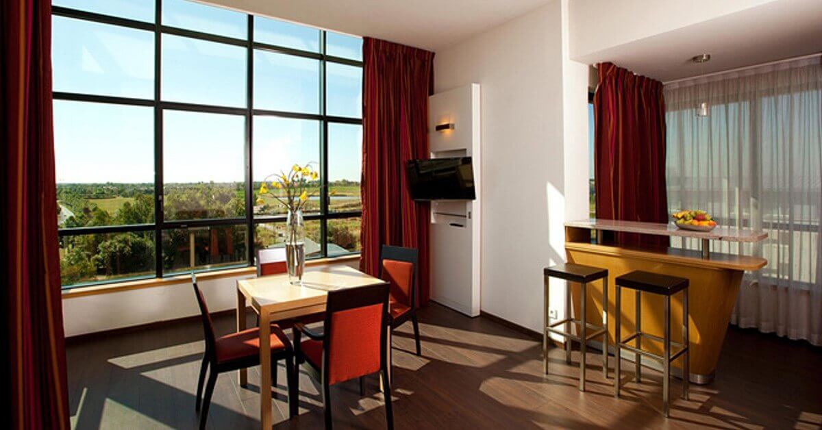 Residhome at Val D'Europe Disneyland Paris Living area of a prestige room in the Reidhome at Disneyland Paris