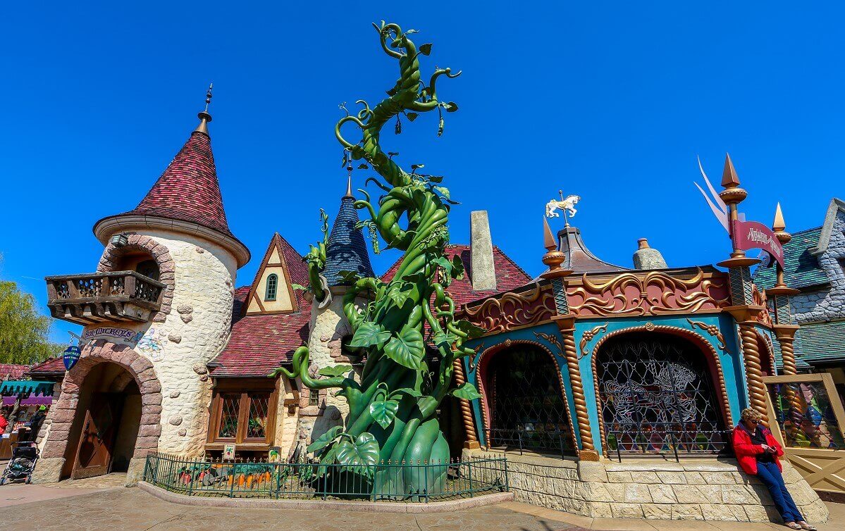 Exterior view of Sir Mickey's Boutique The medieval-style building of Sir Mickey's Boutique in Fantasyland with a big beanstalk in front of it