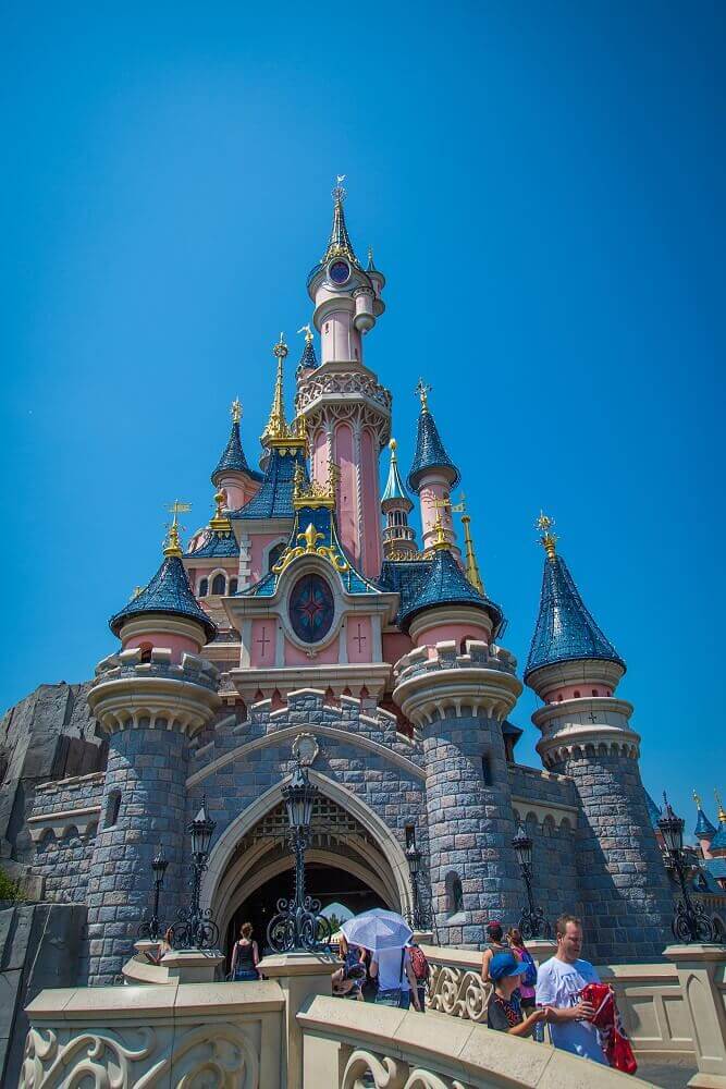 Gate to the castle View of the passage through the large entrance gate at the front of the fairy tale castle in Disneyland Park