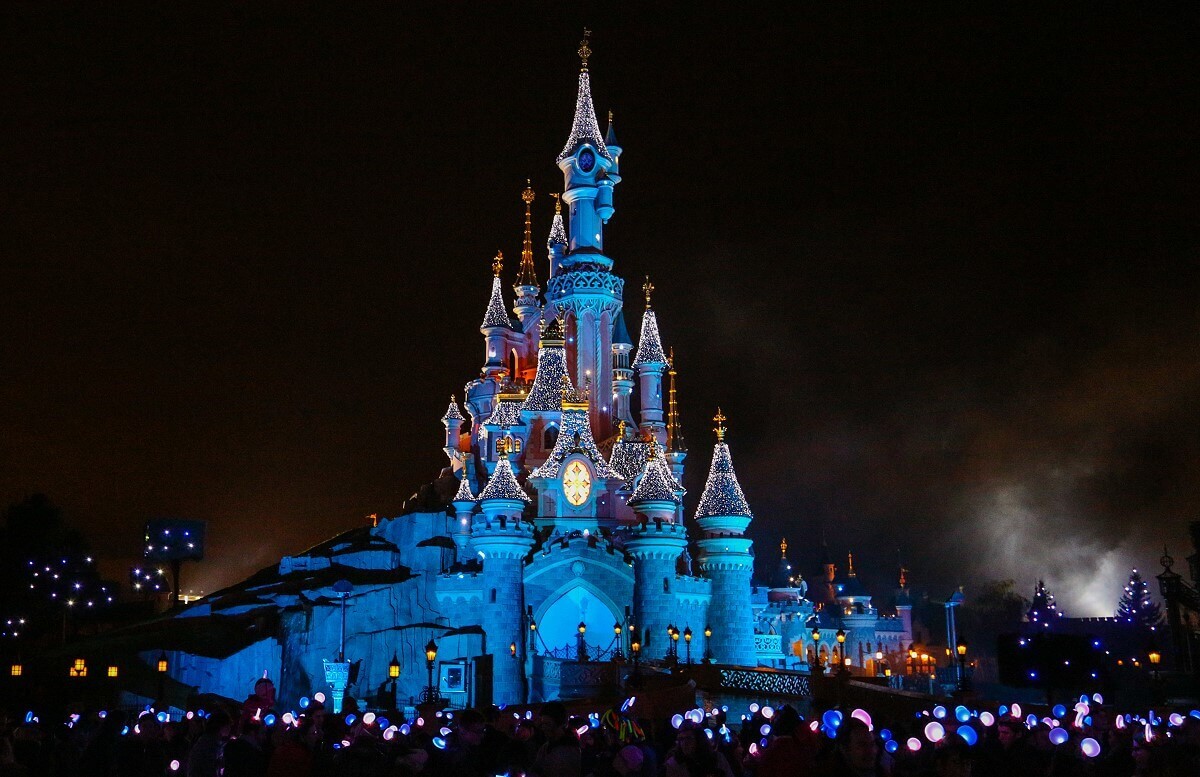 The Dornroeschen castle at night Night shot of the sparkling Sleeping Beauty Castle in Disneyland Park