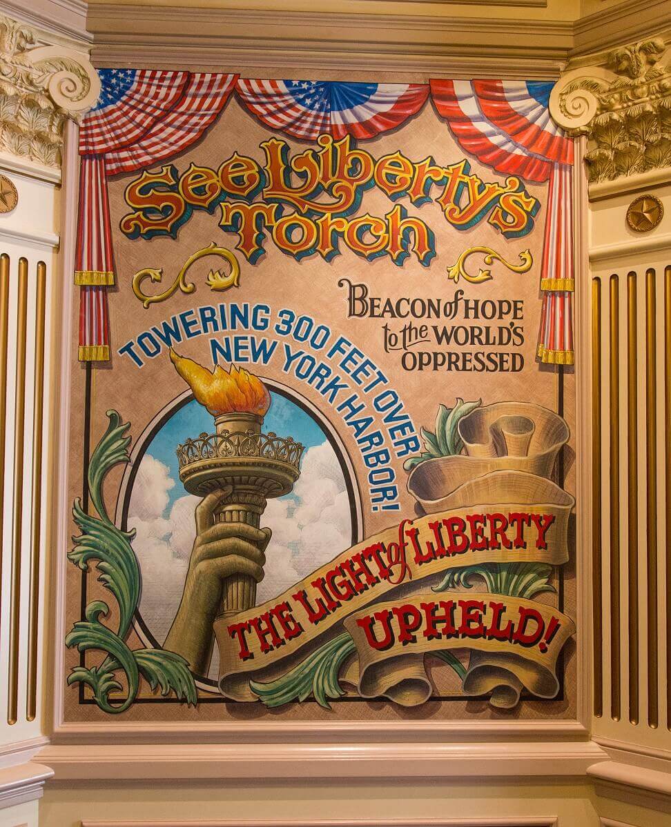 Advertising board to visit the statue Billboard for visiting the statue: See Liberty's Torch - Beacon of Hope to the World's Oppressed