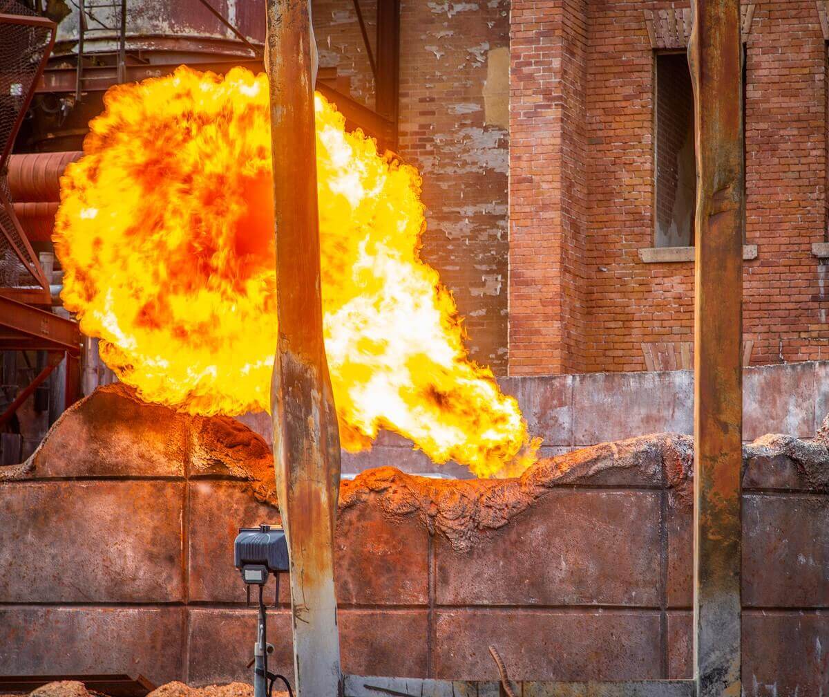 Fire from the underground The fireball of a dragon shoots out from underground