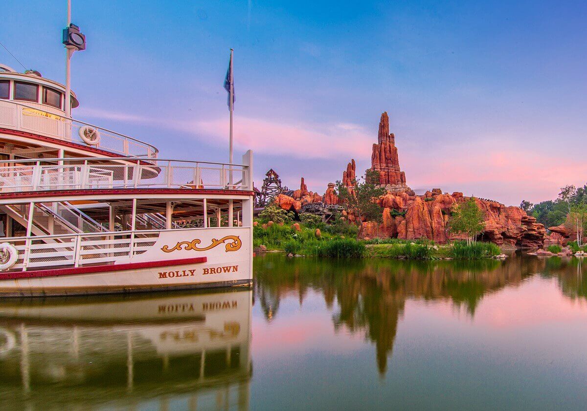 Molly Brown in front of Big Thunder Mountain The Molly Brown at dusk, beyond you can see Big Thunder Mountain