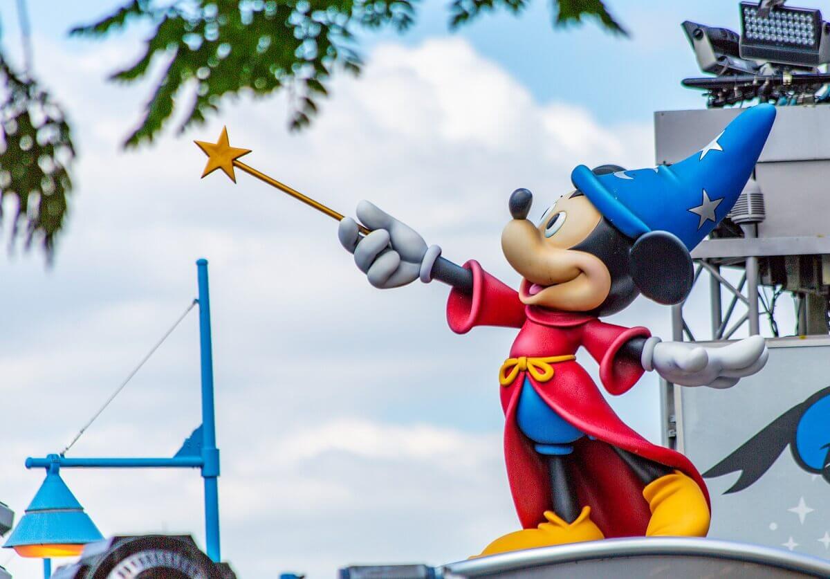 Mickey Mouse figure at Disneyland Mickey Mouse as sorcerer's apprentice with red cape, magic hat and magic wand