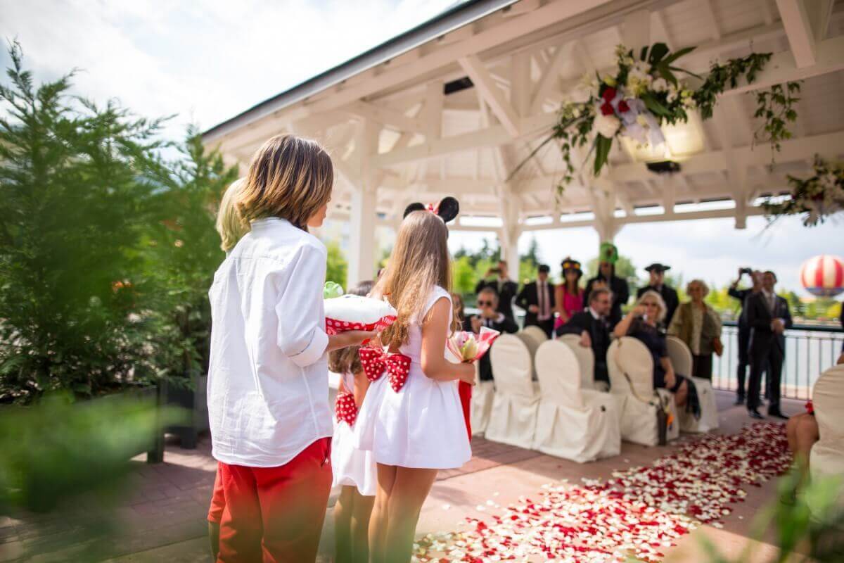 Wedding ceremony at Lake Disney in Disneyland Paris Flower children and ring bearers are ready for a wedding ceremony at Lake Disney in Disneyland Paris