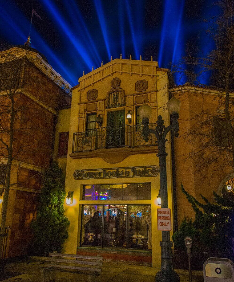 Gower Books & Music Shop window of Gower Books & Music - blue light beams in the background