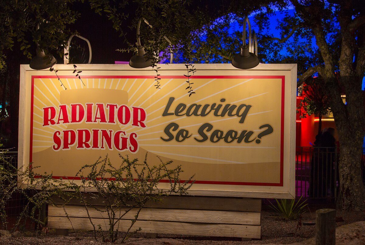 Sign at the exit of Radiator Springs Radiator Spring goodbye sign: Radiator Spring - Leaving so soon?