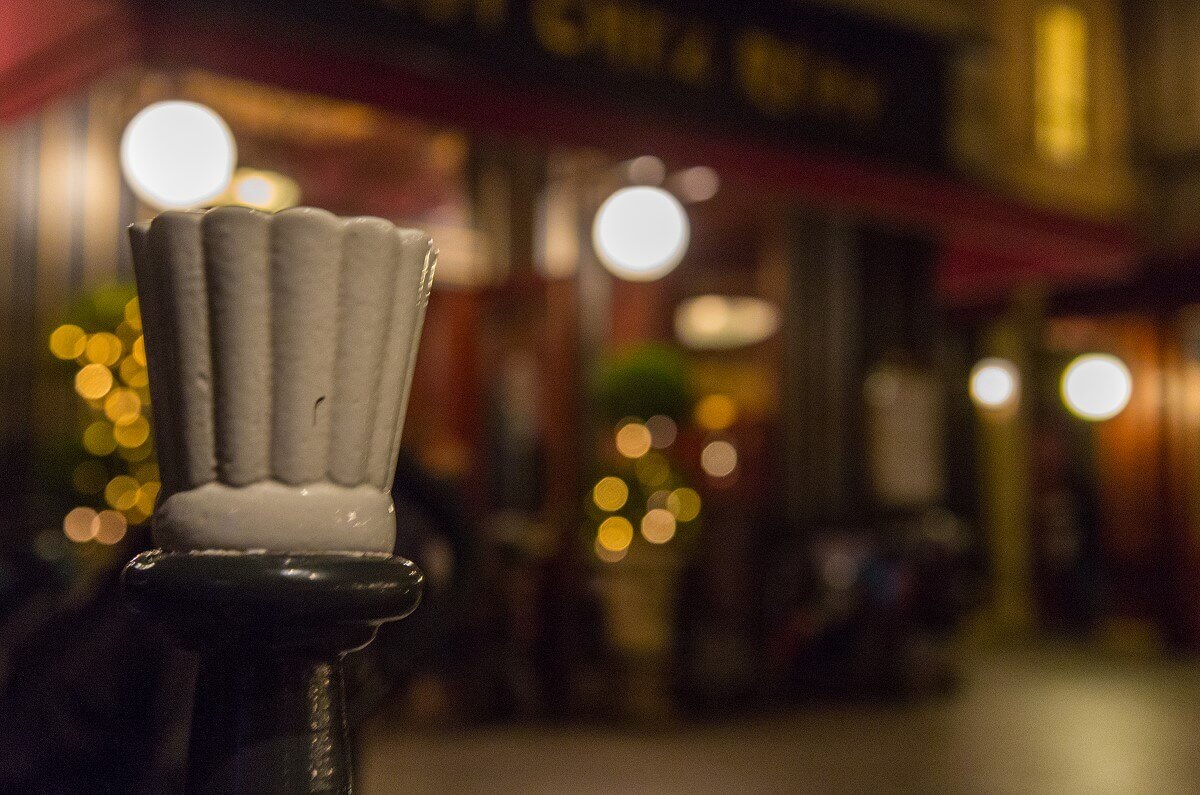 Detail of a bollard at Place de Remy The bollards at Place de Remy wear chef's hats, as this picture of the cute detail shows