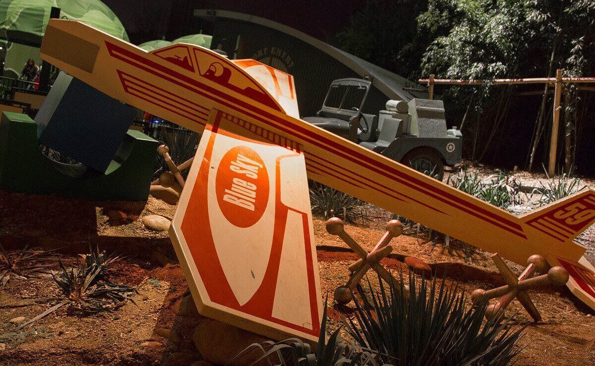 Red Airplane Toy The red airplane toy at the parachute drop with the inscription Blue Sky as well as 59