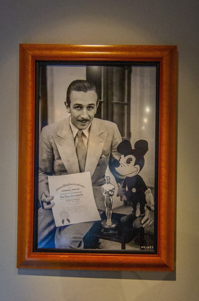 Walt Disney with Mickey Mouse & Oscar 1932 Walt Disney and Mickey Mouse with the certificate and the Oscar awarded to Walter Elias Disney in 1932 as an honorary Oscar for the invention of Mickey