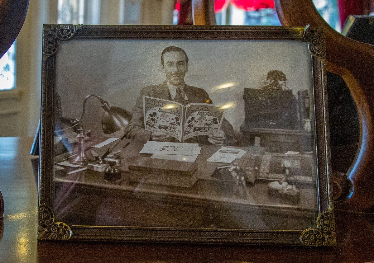Walt Disney at the desk Walt Disney at his desk, reading a Mickey Mouse magazine...